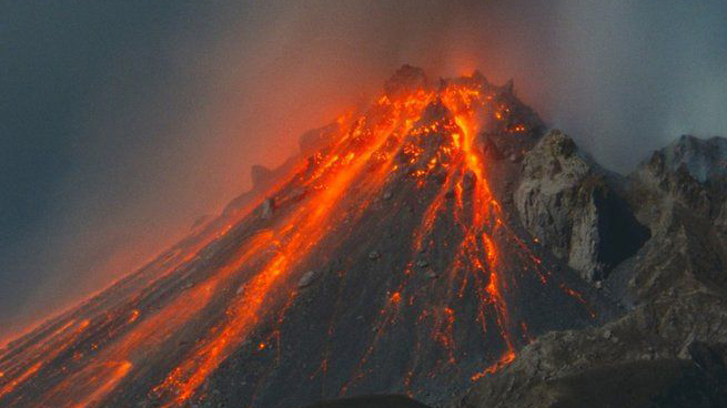 Thousands have been forced to evacuate as Philippine volcano emits rocks and ash.